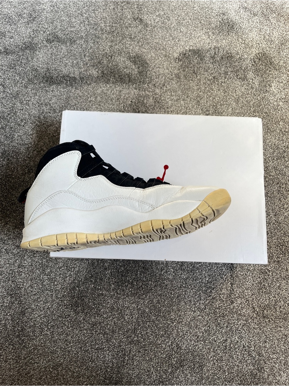 White and Black High-Top Sneaker with Red Accent